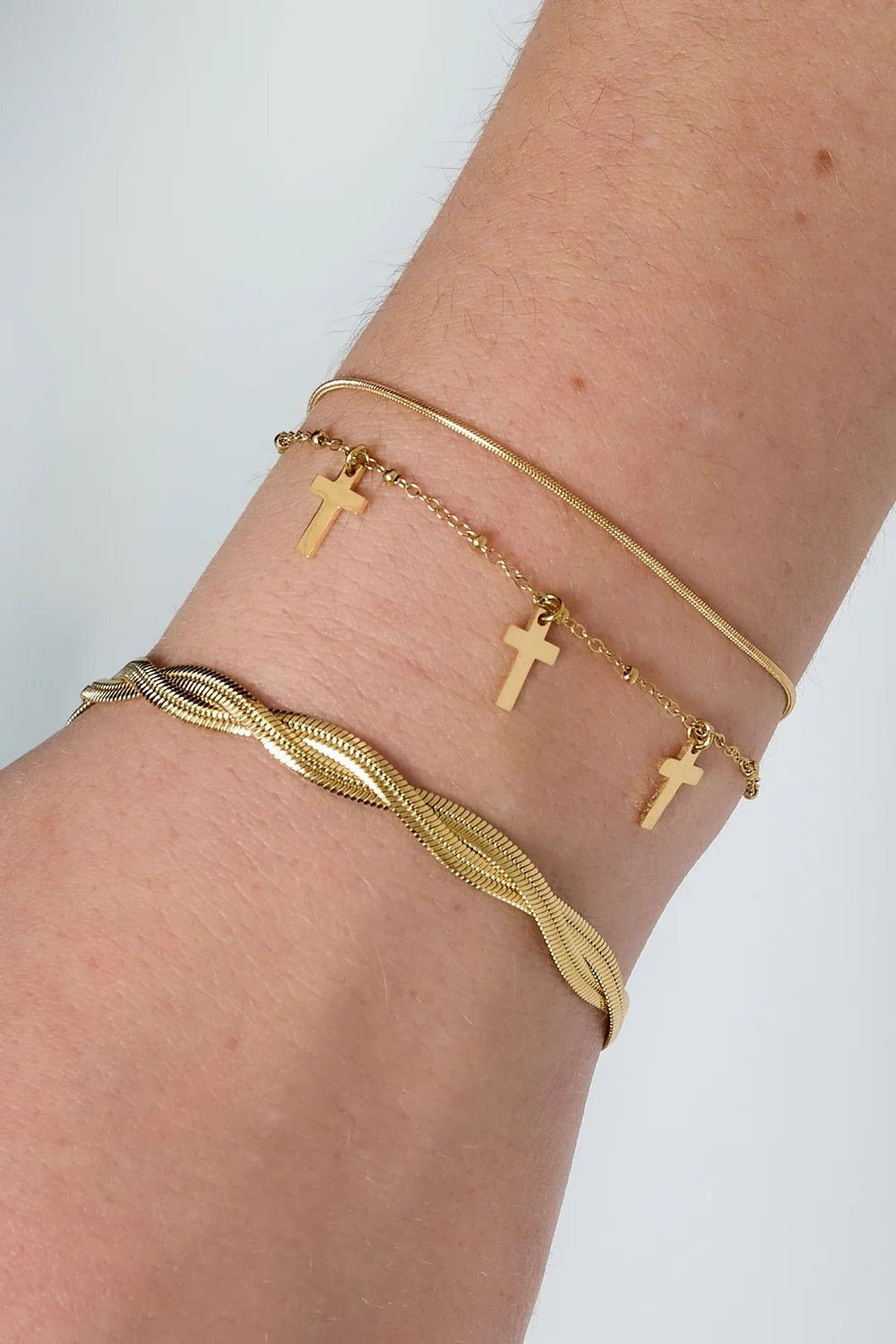 Armband met 3 hangende kruisjes